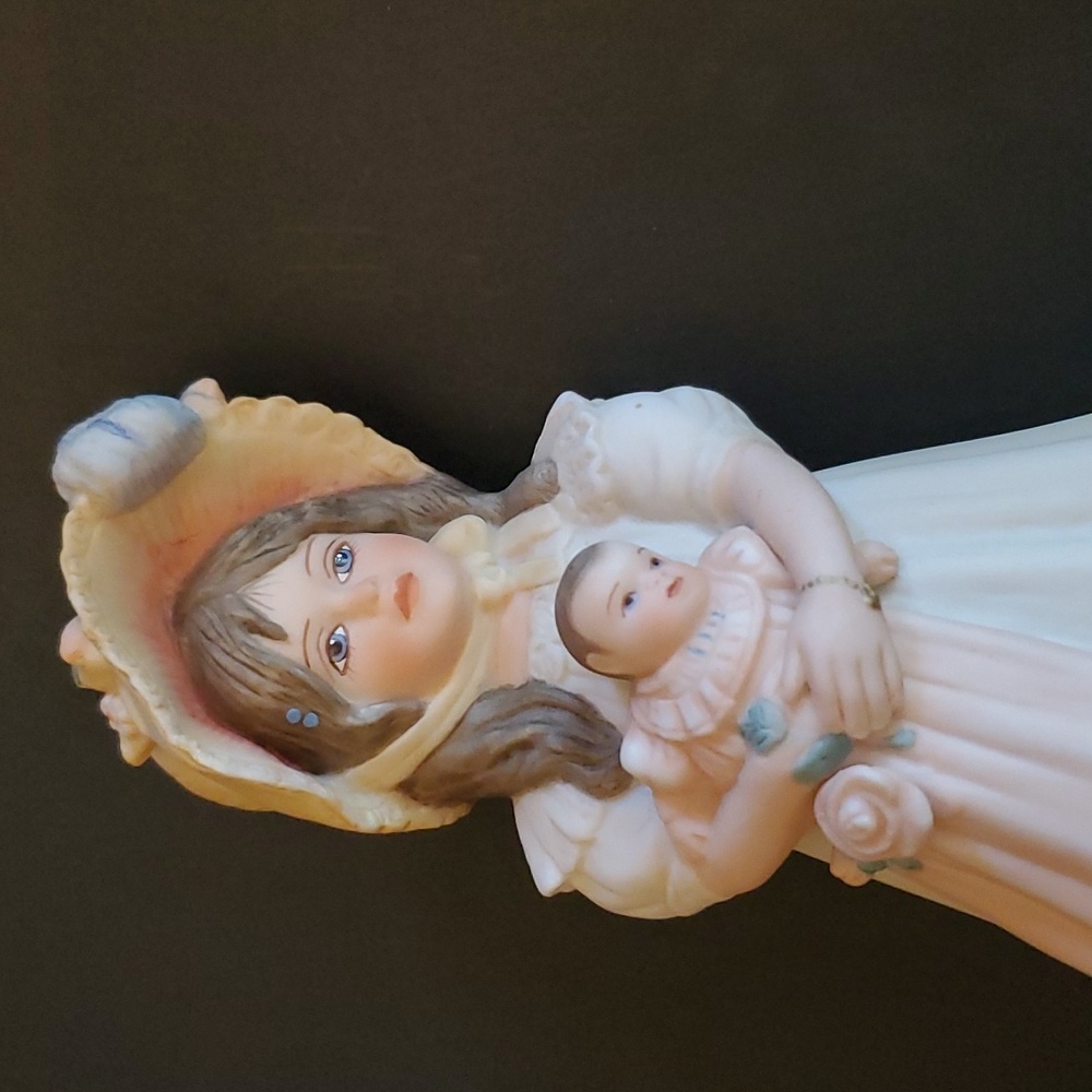 Victorian girl with baby and birds
